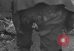 Image of Italian citizens in ruined village Italy, 1944, second 28 stock footage video 65675056390