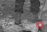 Image of Italian citizens in ruined village Italy, 1944, second 31 stock footage video 65675056390