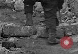 Image of Italian citizens in ruined village Italy, 1944, second 36 stock footage video 65675056390
