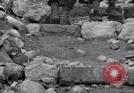 Image of Italian citizens in ruined village Italy, 1944, second 42 stock footage video 65675056390