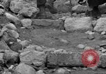Image of Italian citizens in ruined village Italy, 1944, second 43 stock footage video 65675056390