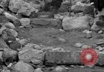 Image of Italian citizens in ruined village Italy, 1944, second 44 stock footage video 65675056390