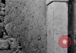 Image of Italian citizens in ruined village Italy, 1944, second 50 stock footage video 65675056390