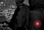 Image of Italian citizens in ruined village Italy, 1944, second 53 stock footage video 65675056390