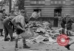 Image of German children burn Nazi materials Cologne Germany, 1945, second 4 stock footage video 65675056409