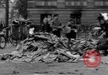 Image of German children burn Nazi materials Cologne Germany, 1945, second 7 stock footage video 65675056409