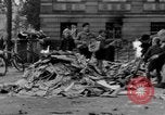Image of German children burn Nazi materials Cologne Germany, 1945, second 8 stock footage video 65675056409