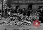 Image of German children burn Nazi materials Cologne Germany, 1945, second 9 stock footage video 65675056409