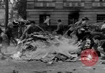 Image of German children burn Nazi materials Cologne Germany, 1945, second 15 stock footage video 65675056409