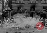 Image of German children burn Nazi materials Cologne Germany, 1945, second 16 stock footage video 65675056409