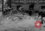 Image of German children burn Nazi materials Cologne Germany, 1945, second 17 stock footage video 65675056409