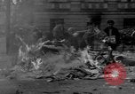 Image of German children burn Nazi materials Cologne Germany, 1945, second 20 stock footage video 65675056409