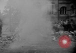 Image of German children burn Nazi materials Cologne Germany, 1945, second 25 stock footage video 65675056409