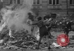 Image of German children burn Nazi materials Cologne Germany, 1945, second 30 stock footage video 65675056409