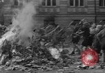 Image of German children burn Nazi materials Cologne Germany, 1945, second 32 stock footage video 65675056409