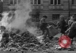 Image of German children burn Nazi materials Cologne Germany, 1945, second 33 stock footage video 65675056409