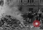 Image of German children burn Nazi materials Cologne Germany, 1945, second 34 stock footage video 65675056409