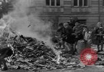Image of German children burn Nazi materials Cologne Germany, 1945, second 36 stock footage video 65675056409