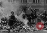 Image of German children burn Nazi materials Cologne Germany, 1945, second 37 stock footage video 65675056409