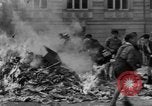 Image of German children burn Nazi materials Cologne Germany, 1945, second 38 stock footage video 65675056409