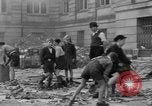 Image of German children burn Nazi materials Cologne Germany, 1945, second 44 stock footage video 65675056409
