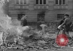 Image of German children burn Nazi materials Cologne Germany, 1945, second 50 stock footage video 65675056409