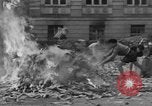 Image of German children burn Nazi materials Cologne Germany, 1945, second 51 stock footage video 65675056409