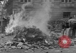 Image of German children burn Nazi materials Cologne Germany, 1945, second 55 stock footage video 65675056409