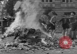 Image of German children burn Nazi materials Cologne Germany, 1945, second 58 stock footage video 65675056409