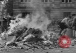 Image of German children burn Nazi materials Cologne Germany, 1945, second 59 stock footage video 65675056409