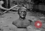 Image of Bronze bust of Adolf Hitler Cologne Germany, 1945, second 28 stock footage video 65675056411