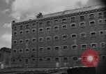 Image of partially demolished large building Cologne Germany, 1945, second 29 stock footage video 65675056423