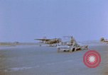Image of Loading bombs on B-26 aircraft France, 1945, second 1 stock footage video 65675056439