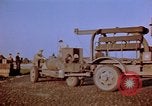 Image of Loading bombs on B-26 aircraft France, 1945, second 56 stock footage video 65675056439