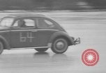 Image Voiture de course sur la glace Pennsylvania United States USA, 1962, de la seconde 52 séquences d'archives historiques vidéo 65675056474