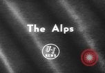 Image of animals cross Alps Mountains United States USA, 1962, second 1 stock footage video 65675056485