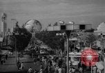 Image of crowds at the Worlds Fair New York United States USA, 1964, second 12 stock footage video 65675056499