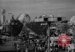 Image of crowds at the Worlds Fair New York United States USA, 1964, second 13 stock footage video 65675056499