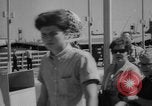 Image of crowds at the Worlds Fair New York United States USA, 1964, second 17 stock footage video 65675056499