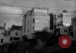 Immagine di Il crollo di edifici da flood erosione United States USA, 1965, secondo 1 filmato di repertorio 65675056505
