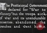 Image of war-weary Russian troops returning home Russia, 1917, second 1 stock footage video 65675056561