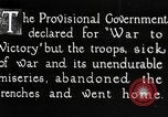 Image of war-weary Russian troops returning home Russia, 1917, second 4 stock footage video 65675056561