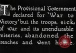 Image of war-weary Russian troops returning home Russia, 1917, second 5 stock footage video 65675056561