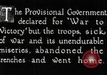 Image of war-weary Russian troops returning home Russia, 1917, second 6 stock footage video 65675056561