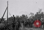 Image of war-weary Russian troops returning home Russia, 1917, second 51 stock footage video 65675056561