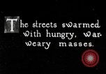 Image of war-weary Russian troops returning home Russia, 1917, second 58 stock footage video 65675056561