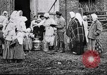 Image of Russian children receiving milk from local Soviet Russia, 1918, second 5 stock footage video 65675056584