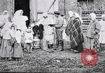 Image of Russian children receiving milk from local Soviet Russia, 1918, second 6 stock footage video 65675056584