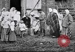 Image of Russian children receiving milk from local Soviet Russia, 1918, second 7 stock footage video 65675056584
