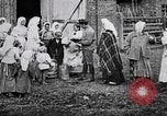 Image of Russian children receiving milk from local Soviet Russia, 1918, second 12 stock footage video 65675056584